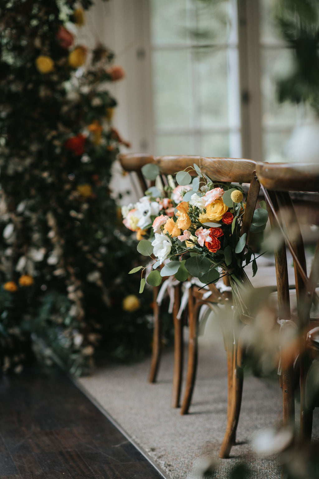 Sun-drenched pew flower from the Sunshine Coast Collection, combining coastal vibrancy with Toronto wedding sophistication