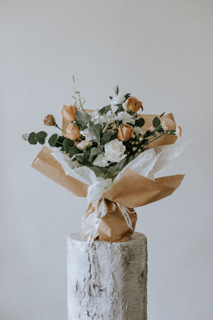 Large Neutral Toned De Novo Bouquet: Classic Roses Merged with Seasonal Selections in Distinctive Woven Fabric
