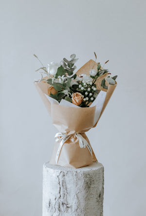 Small Neutral Toned De Novo Signature Bouquet: Chic Roses and Seasonal Blossoms Showcasing Toronto's Elegance in Woven Wrapping