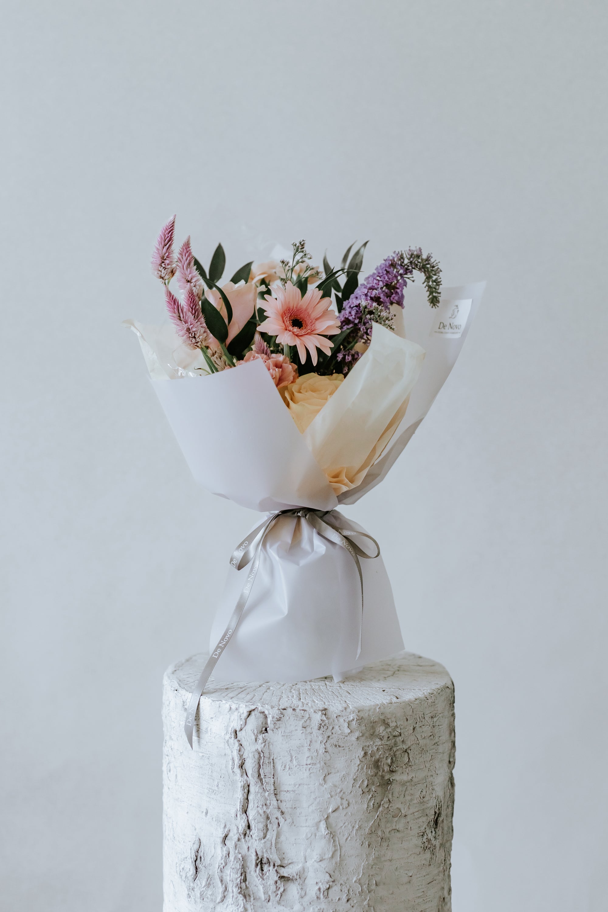 Small Vibrant De Novo Signature Bouquet: Toronto-inspired Vibrant Blooms in Distinguished Layered Woven Wrap